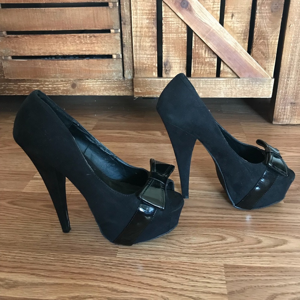 Black sued heels with a bow tie